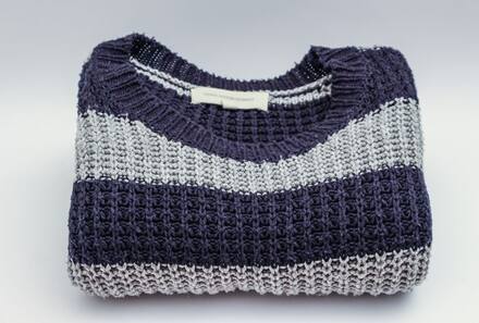A folded striped knit jumper