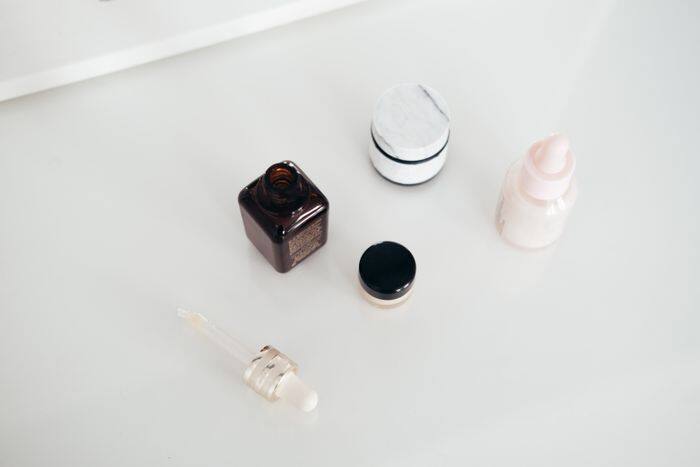 Minimal fragrance bottles on marble