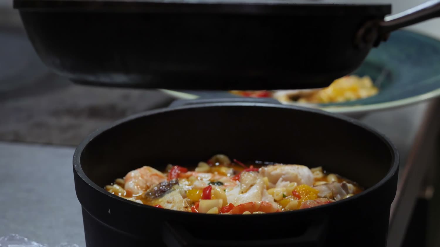 A finished dish plated in the kitchen